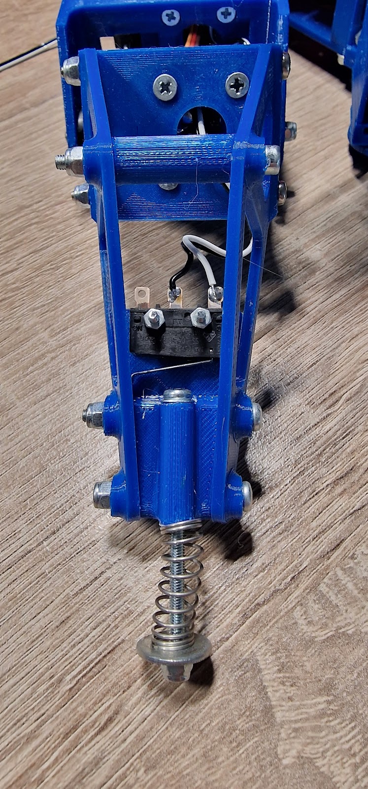 Leg switch with the spring mounted